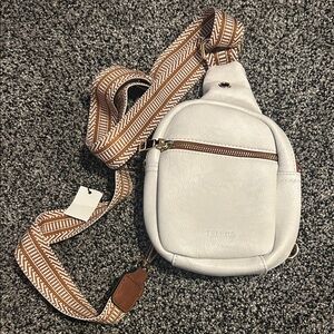 Stylish White Crossbody Bag with Patterned Strap